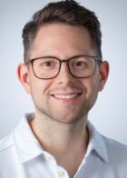 Portrait von Dr. med. Luca Schneider.