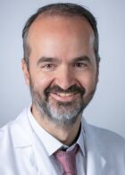 Portrait von Dr. med. univ. (GR) Christos Georgiou.