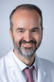 Portrait von Dr. med. univ. (GR) Christos Georgiou.