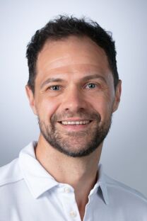 Portrait von Dr. med. Patrick Brust.